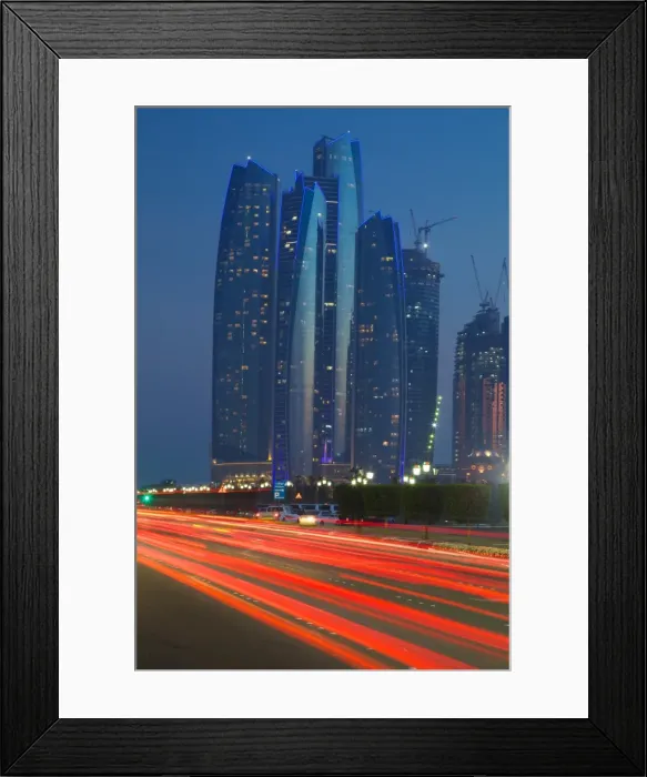 Framed Print : Emirate Towers and car tail lights at night, Abu Dhabi, United Arab Emirates, Middle East Framed Print : Emirate Towers and car tail lights at night, Abu Dhabi, United Arab Emirates, Middle East