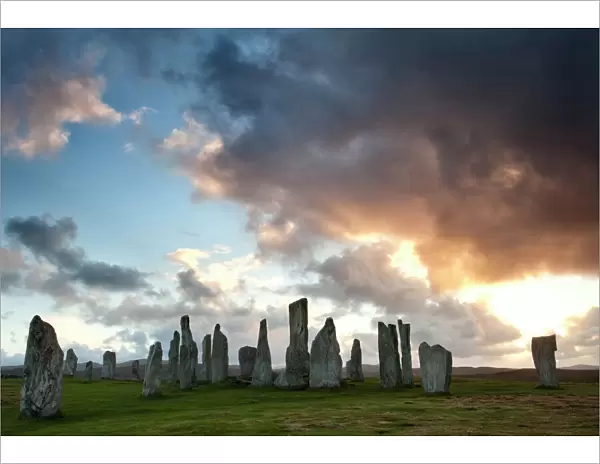 Standing Stones of Callanish at sunset with dramatic sky in the background, near Carloway, Isle of Lewis, Outer Hebrides, Scotland, United Kingdom, Europe