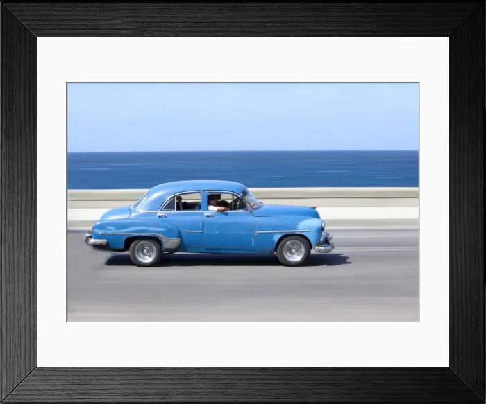 Framed Print : Panned shot of old blue American car to capture sense of movement, with the Caribbean Sea in the background, The Malecon, Havana Centro, Cuba, West Indies, Central America Framed Print : Panned shot of old blue American car to capture sense of movement, with the Caribbean Sea in the background, The Malecon, Havana Centro, Cuba, West Indies, Central America