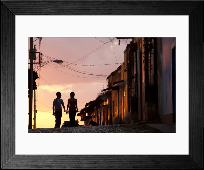 Framed Print : Two young people in silhouette at sunset on cobbled street with colourful orange sky behind, Trinidad, UNESCO World Heritage Site, Cuba, West Indies, Central America Framed Print : Two young people in silhouette at sunset on cobbled street with colourful orange sky behind, Trinidad, UNESCO World Heritage Site, Cuba, West Indies, Central America