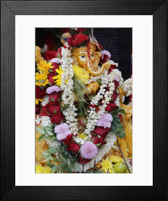 Framed Print : Statue of the Hindu God Ganesh with garlands, Paris, France, Europe Framed Print : Statue of the Hindu God Ganesh with garlands, Paris, France, Europe