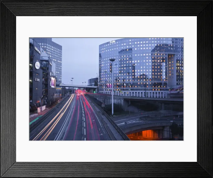 Framed Print : Evening traffic flowing through the La Defense area of Paris, France, Europe Framed Print : Evening traffic flowing through the La Defense area of Paris, France, Europe
