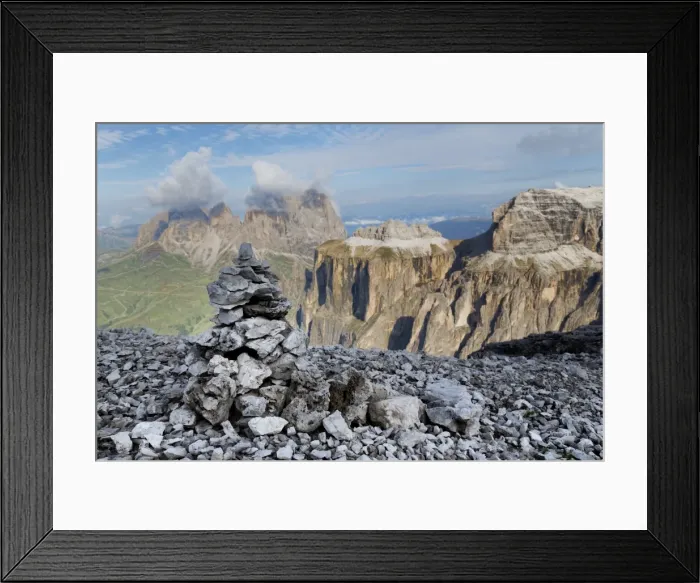 Framed Print : Stone cairn on Sass Pordoi mountain in the Dolomites near Canazei, with cloud covered Sassolungo mountains in the distance, Trentino-Alto Adige, Italy, Europe Framed Print : Stone cairn on Sass Pordoi mountain in the Dolomites near Canazei, with cloud covered Sassolungo mountains in the distance, Trentino-Alto Adige, Italy, Europe