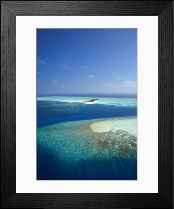 Framed Print : Aerial view of tropical island and lagoon, Maldives, Indian Ocean, Asia Framed Print : Aerial view of tropical island and lagoon, Maldives, Indian Ocean, Asia