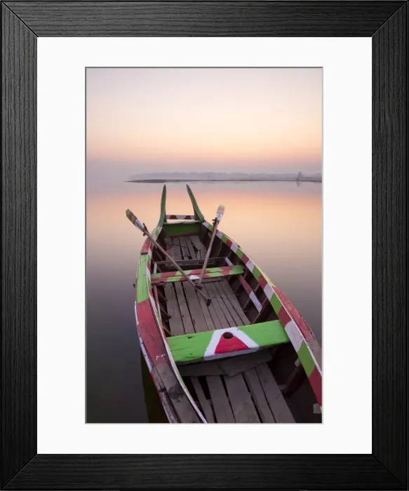 Framed Print : Traditional rowing boat moored on the edge of flat calm Taungthaman Lake at dawn with the colours of the sky reflecting in the calm water, close to the famous U Bein teak bridge, near Mandalay, Myanmar (Burma), Asia Framed Print : Traditional rowing boat moored on the edge of flat calm Taungthaman Lake at dawn with the colours of the sky reflecting in the calm water, close to the famous U Bein teak bridge, near Mandalay, Myanmar (Burma), Asia