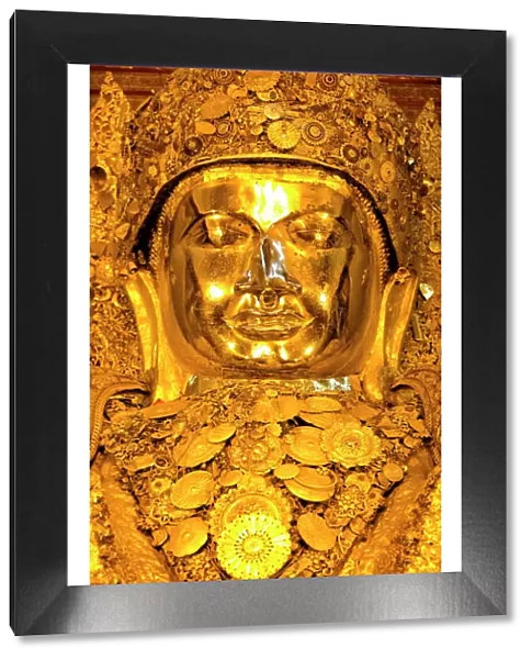 Myanmars most famous Buddha image, 13ft high and covered in 6 inches of pure gold leaf, Mahamuni Paya, Mandalay, Myanmar (Burma), Southeast Asia