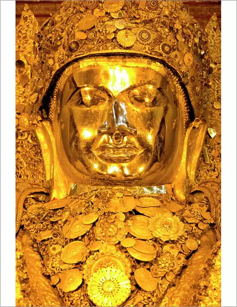 Myanmars most famous Buddha image, 13ft high and covered in 6 inches of pure gold leaf, Mahamuni Paya, Mandalay, Myanmar (Burma), Southeast Asia