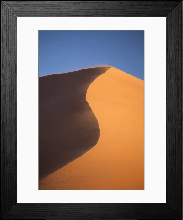 Framed Print : The orange sand and snaking ridge of Elim Dune against blue sky, Namib Desert near Sesriem, Namib Naukluft Park, Namibia, Africa Framed Print : The orange sand and snaking ridge of Elim Dune against blue sky, Namib Desert near Sesriem, Namib Naukluft Park, Namibia, Africa