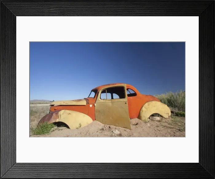 Framed Print : Old abandoned car outside the service station at Solitaire, a lonely outpost near Sesriem, Namib Naukluft Park, Namibia, Africa Framed Print : Old abandoned car outside the service station at Solitaire, a lonely outpost near Sesriem, Namib Naukluft Park, Namibia, Africa
