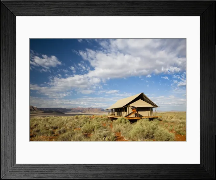 Framed Print : One of the luxury tents set in a magnificent landscape of orange sand dunes and sandstone mountains at Wolwedans Dune Camp in the Namib Rand game reserve, Namib Naukluft Park, Namibia, Africa Framed Print : One of the luxury tents set in a magnificent landscape of orange sand dunes and sandstone mountains at Wolwedans Dune Camp in the Namib Rand game reserve, Namib Naukluft Park, Namibia, Africa