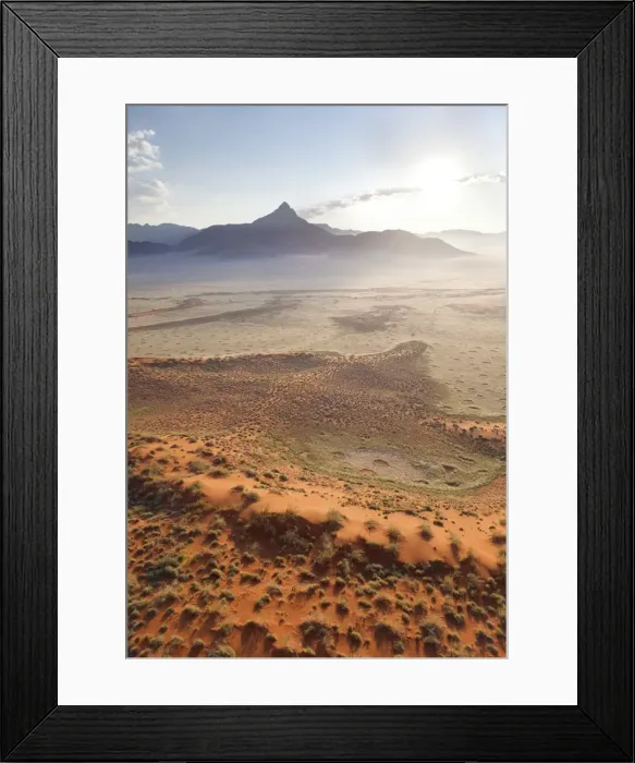 Framed Print : Aerial view from hot air balloon at dawn over magnificent desert landscape of sand dunes, mountains and Fairy Circles, Namib Rand game reserve Namib Naukluft Park, Namibia, Africa Framed Print : Aerial view from hot air balloon at dawn over magnificent desert landscape of sand dunes, mountains and Fairy Circles, Namib Rand game reserve Namib Naukluft Park, Namibia, Africa