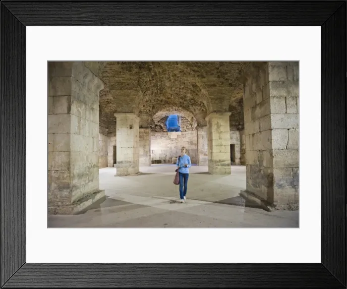 Framed Print : Tourist exploring the underground halls at Diocletians Palace, UNESCO World Heritage Site, Split, Dalmatian Coast, Croatia, Europe Framed Print : Tourist exploring the underground halls at Diocletians Palace, UNESCO World Heritage Site, Split, Dalmatian Coast, Croatia, Europe