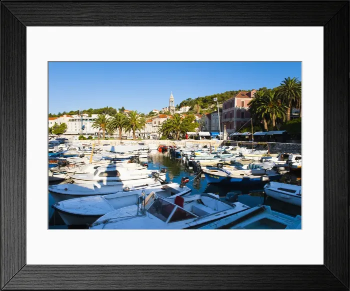 Framed Print : Hvar town centre, boats in Hvar harbour and church bell tower, Hvar Island, Dalmatian Coast, Adriatic, Croatia, Europe Framed Print : Hvar town centre, boats in Hvar harbour and church bell tower, Hvar Island, Dalmatian Coast, Adriatic, Croatia, Europe