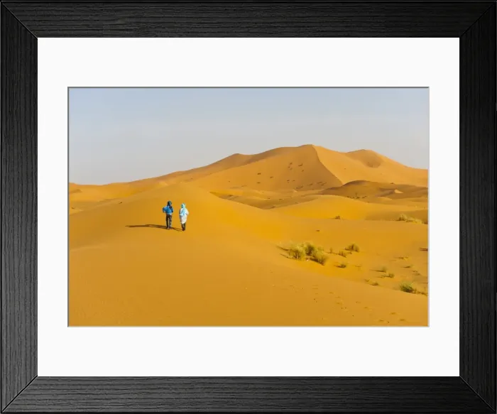 Framed Print : Two Berber men walking in the sand dunes of Erg Chebbi Desert, Sahara Desert near Merzouga, Morocco, North Africa, Africa Framed Print : Two Berber men walking in the sand dunes of Erg Chebbi Desert, Sahara Desert near Merzouga, Morocco, North Africa, Africa