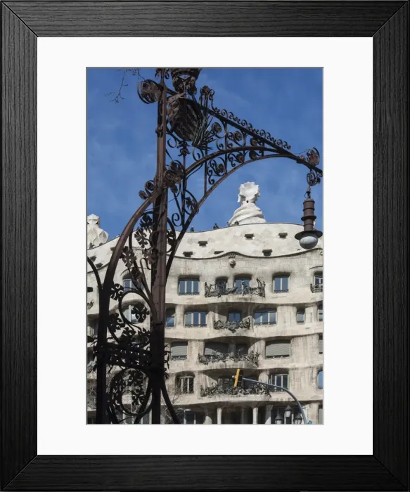 Framed Print : A wrought iron lamp frames La Pedrera (Casa Mila), an apartment block designed by Antonio Gaudi, UNESCO World Heritage Site, Passeig de Gracia, Barcelona, Catalunya, Spain, Europe Framed Print : A wrought iron lamp frames La Pedrera (Casa Mila), an apartment block designed by Antonio Gaudi, UNESCO World Heritage Site, Passeig de Gracia, Barcelona, Catalunya, Spain, Europe