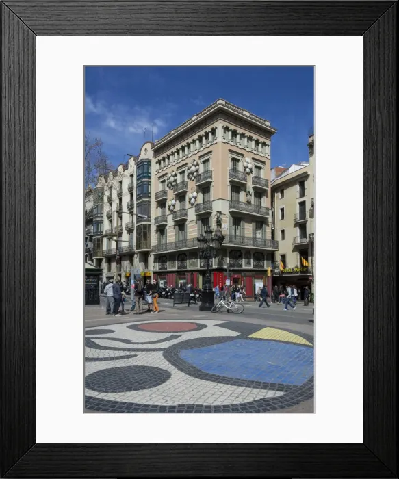 Framed Print : A mosaic pavement by Miro and building decorated with Umbrellas, on Las Ramblas, Barcelona, Catalunya, Spain, Europe Framed Print : A mosaic pavement by Miro and building decorated with Umbrellas, on Las Ramblas, Barcelona, Catalunya, Spain, Europe
