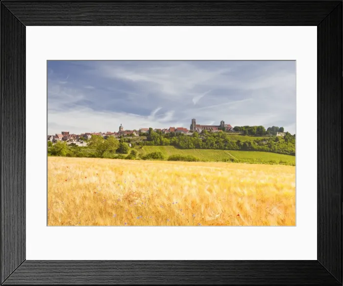 Framed Print : A wheat field below the hilltop village of Vezelay in the Yonne area of Burgundy, France, Europe Framed Print : A wheat field below the hilltop village of Vezelay in the Yonne area of Burgundy, France, Europe