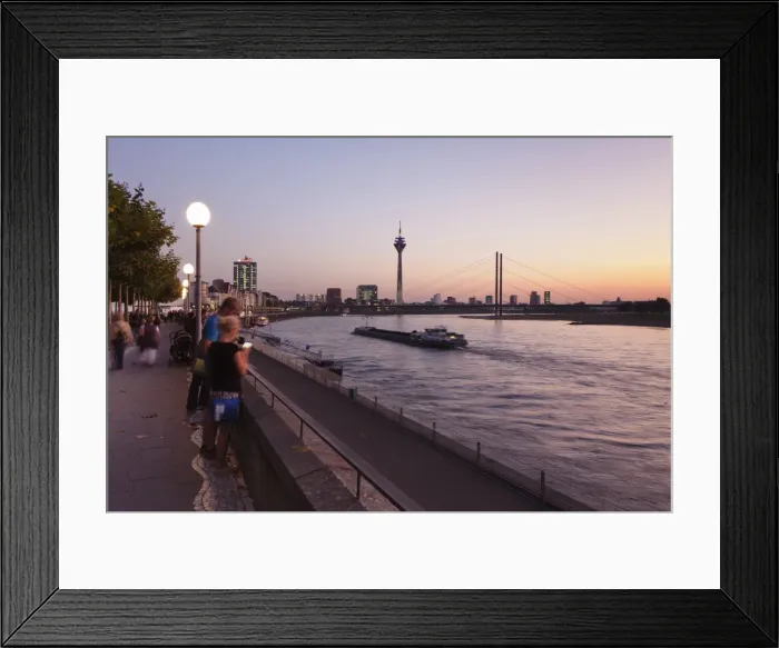Framed Print : Rhein promenade with Rheinturm tower and Rheinkniebrucke bridge, Dusseldorf, North Rhine Westphalia, Germany, Europe Framed Print : Rhein promenade with Rheinturm tower and Rheinkniebrucke bridge, Dusseldorf, North Rhine Westphalia, Germany, Europe