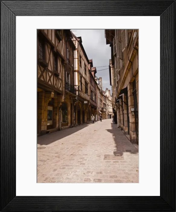 Framed Print : A narrow street with half timbered houses in the old city of Dijon, Burgundy, France, Europe Framed Print : A narrow street with half timbered houses in the old city of Dijon, Burgundy, France, Europe