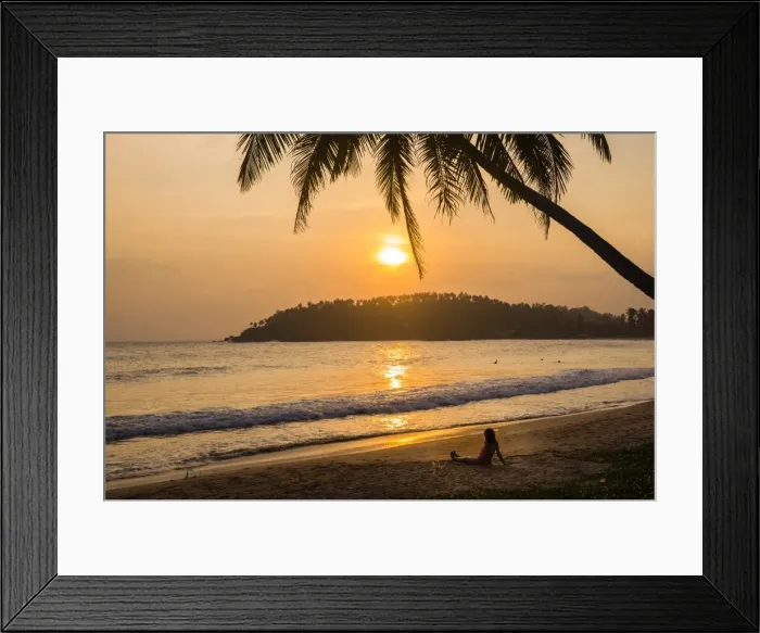 Framed Print : Woman sitting on Mirissa Beach watching the sun set, South Coast of Sri Lanka, Southern Province, Sri Lanka, Asia Framed Print : Woman sitting on Mirissa Beach watching the sun set, South Coast of Sri Lanka, Southern Province, Sri Lanka, Asia