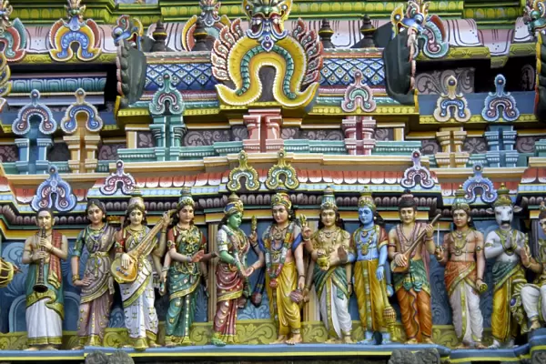 Intricate carving work on the gopuram of a temple, Tamil Nadu, India, Asia