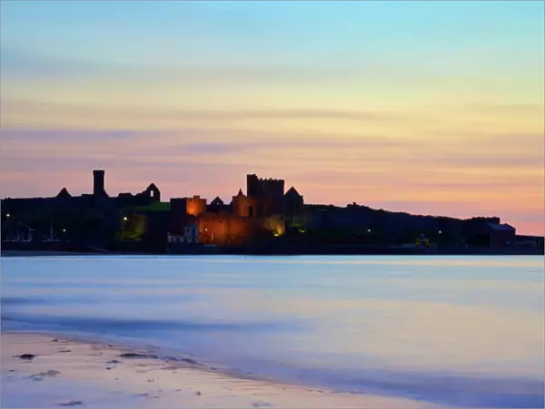 Peel Castle at dusk, St. Patricks Isle, Isle of Man, Europe
