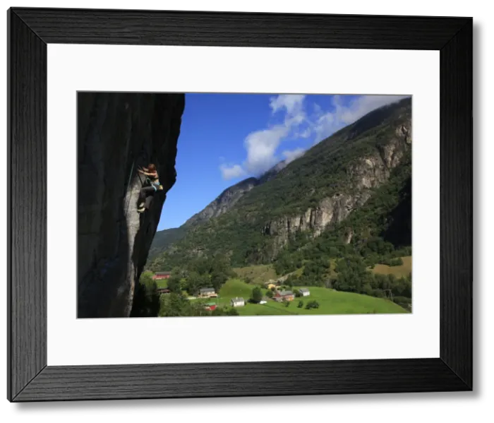 Framed Print : A female climber tackles a steep cliff at Loven, near Aurland, western Norway, Scandinavia, Europe Framed Print : A female climber tackles a steep cliff at Loven, near Aurland, western Norway, Scandinavia, Europe