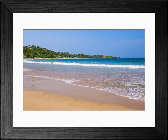 Framed Print : Golden sands and blue waters of the Indian Ocean at Mirissa Beach, South Coast, Sri Lanka, Asia Framed Print : Golden sands and blue waters of the Indian Ocean at Mirissa Beach, South Coast, Sri Lanka, Asia