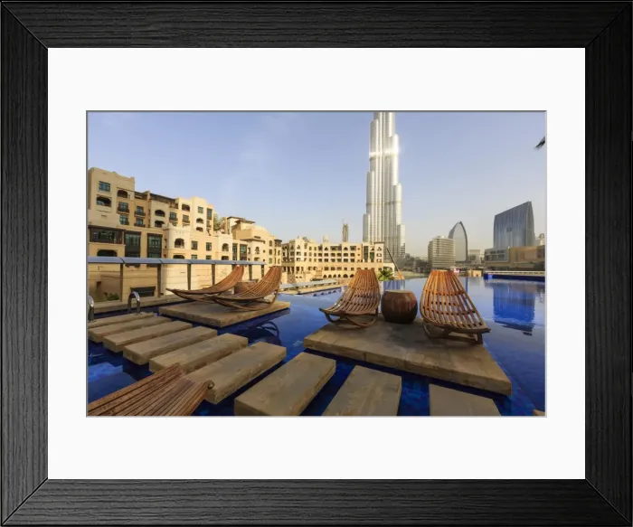 Framed Print : Burj Khalifa seen from hotel swimming pool, Dubai, United Arab Emirates, Middle East Framed Print : Burj Khalifa seen from hotel swimming pool, Dubai, United Arab Emirates, Middle East