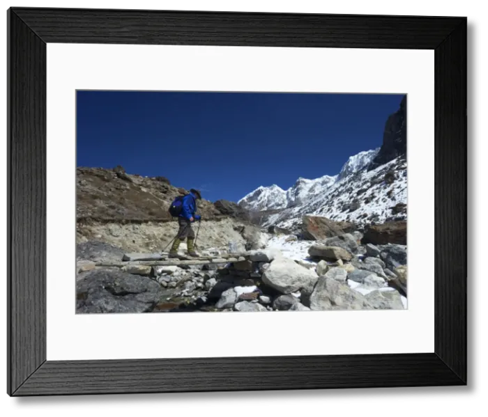 Framed Print : Trekker crossing the Chola Khola valley near Dzonglha, Solukhumbu District, Sagarmatha National Park, UNESCO World Heritage Site, Nepal, Himalayas, Asia Framed Print : Trekker crossing the Chola Khola valley near Dzonglha, Solukhumbu District, Sagarmatha National Park, UNESCO World Heritage Site, Nepal, Himalayas, Asia
