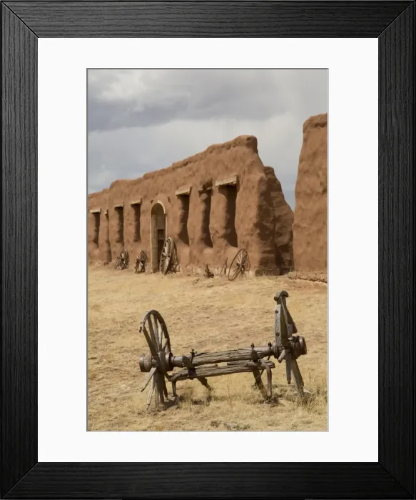 Framed Print : Old wagon wheels with remnants of Fort Union behind, Fort Union National Monument, New Mexico, United States of America, North America Framed Print : Old wagon wheels with remnants of Fort Union behind, Fort Union National Monument, New Mexico, United States of America, North America