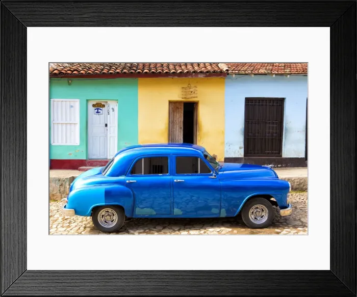 Framed Print : Bright blue vintage American car parked in front of colourful painted colonial houses, Trinidad, UNESCO World Heritage Site, Cuba, West Indies, Central America Framed Print : Bright blue vintage American car parked in front of colourful painted colonial houses, Trinidad, UNESCO World Heritage Site, Cuba, West Indies, Central America