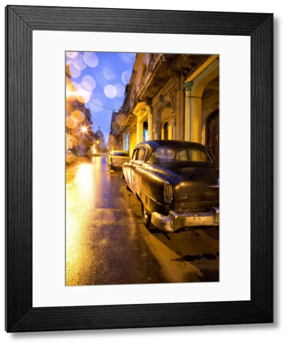 Framed Print : Low light view along a street towards The Capitolio with street lights reflecting in the wet tarmac and wet car bodywork after rain, Havana Centro, Havana, Cuba, West Indies, Central America Framed Print : Low light view along a street towards The Capitolio with street lights reflecting in the wet tarmac and wet car bodywork after rain, Havana Centro, Havana, Cuba, West Indies, Central America