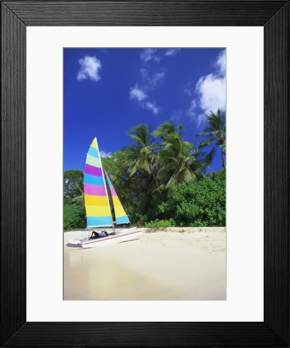 Framed Print : Man Lying on His Sailing Boat at St James Beach, Barbados, Caribbean Framed Print : Man Lying on His Sailing Boat at St James Beach, Barbados, Caribbean