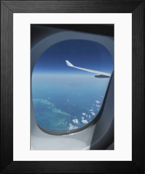 Framed Print : Airplane flying over Bahamas sand banks, West Indies, Central America Framed Print : Airplane flying over Bahamas sand banks, West Indies, Central America