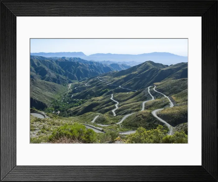 Framed Print : Serpentine bends in road going up the mountain, near Mendoza, Argentina, South America Framed Print : Serpentine bends in road going up the mountain, near Mendoza, Argentina, South America