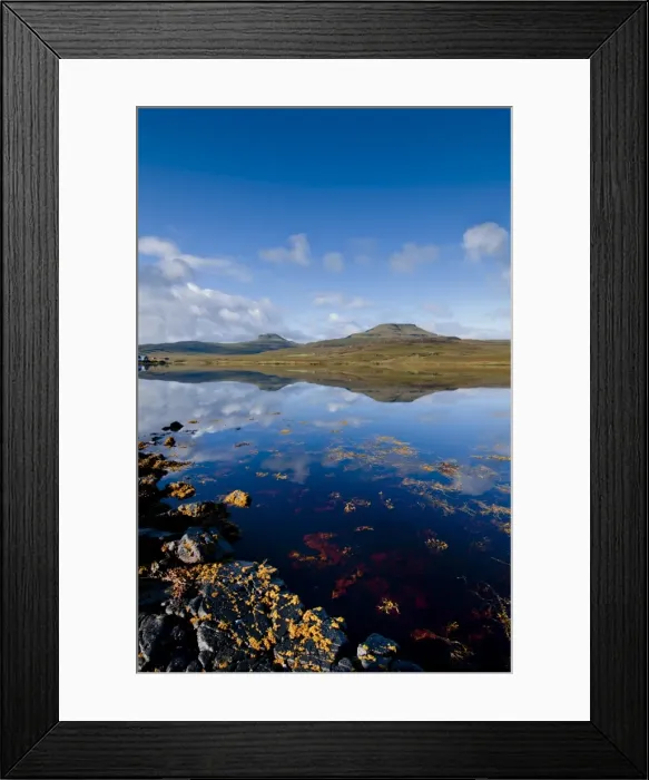Framed Print : Craggy seascape of Loch Dunvegan on the Isle of Skye, with Macleods Table in background. Isle of Skye, Inner Hebrides, Scotland, United Kingdom, Europe
