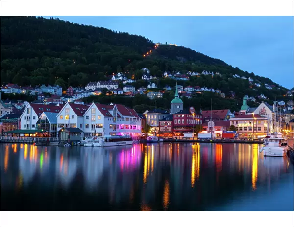 Bergens picturesque Bryggen District illuminated at dusk, UNESCO World Heritage Site, Bergen, Hordaland, Norway, Scandinavia, Europe