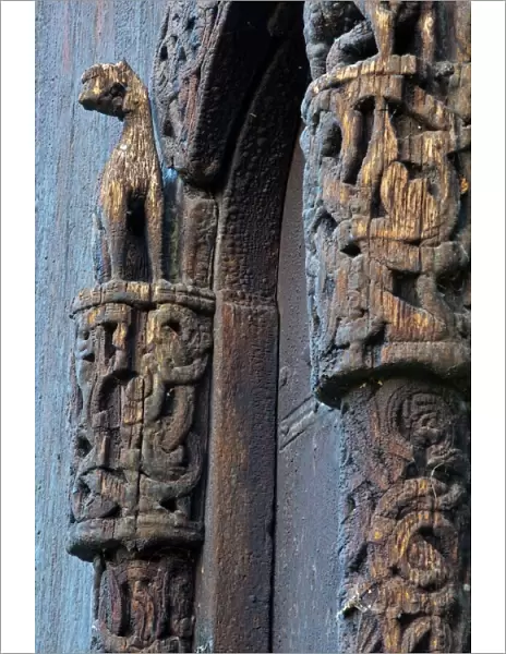 Detail of carved portal arch, Lom Stave Church, Oppland, Gudbrandsdal, Norway, Scandinavia, Europe