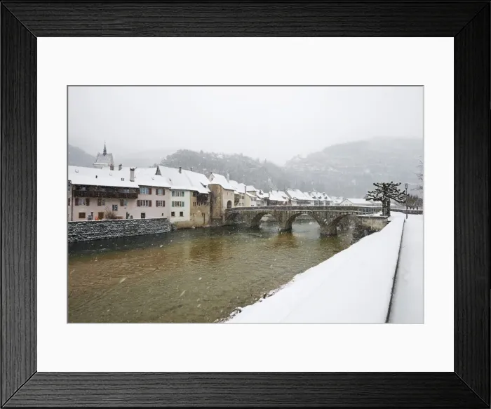 Framed Print : Snow covered town of St. Ursanne, Jura, Switzerland, Europe Framed Print : Snow covered town of St. Ursanne, Jura, Switzerland, Europe