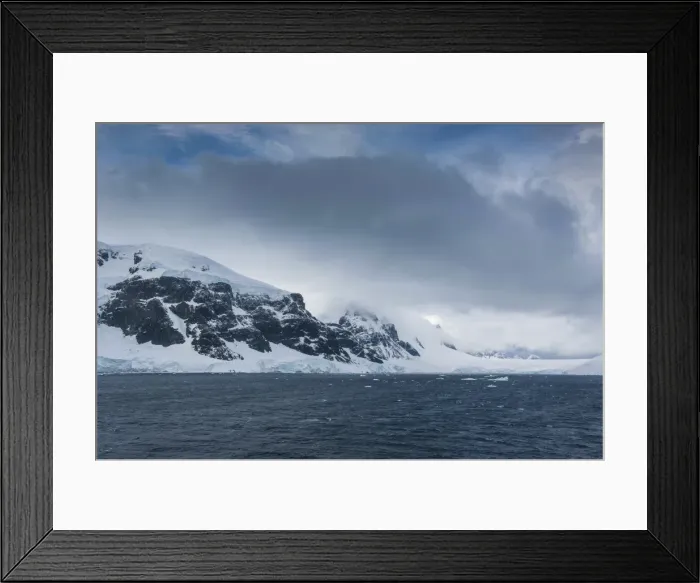 Framed Print : Dark clouds over the mountains and glaciers of Port Lockroy research station, Antarctica, Polar Regions Framed Print : Dark clouds over the mountains and glaciers of Port Lockroy research station, Antarctica, Polar Regions