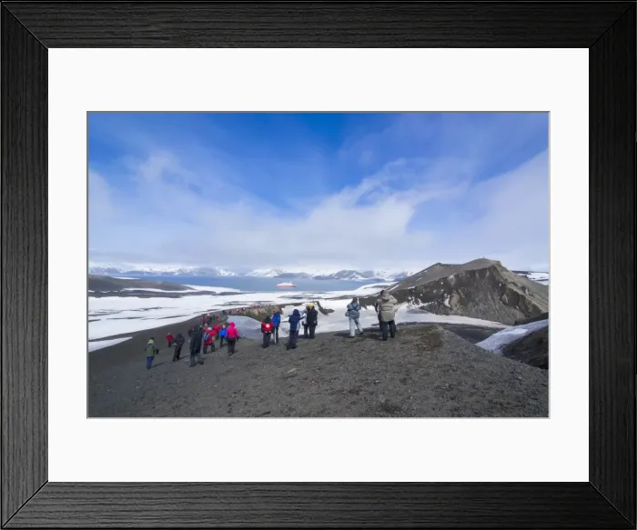 Framed Print : Tourists looking at the Volcano crater at Deception Island, South Shetland Islands, Antarctica, Polar Regions Framed Print : Tourists looking at the Volcano crater at Deception Island, South Shetland Islands, Antarctica, Polar Regions