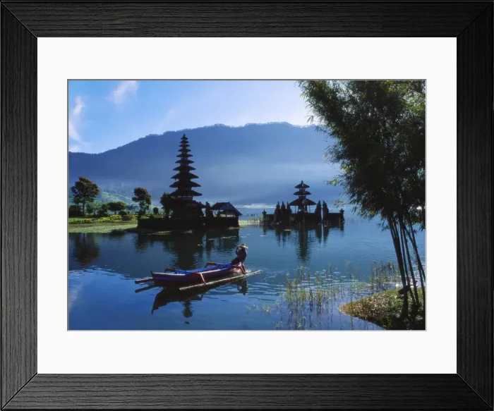 Framed Print : Man in Boat Rowing and Hindu Temples at Lake Bratan, Pura Ulu Danau, Bali Framed Print : Man in Boat Rowing and Hindu Temples at Lake Bratan, Pura Ulu Danau, Bali