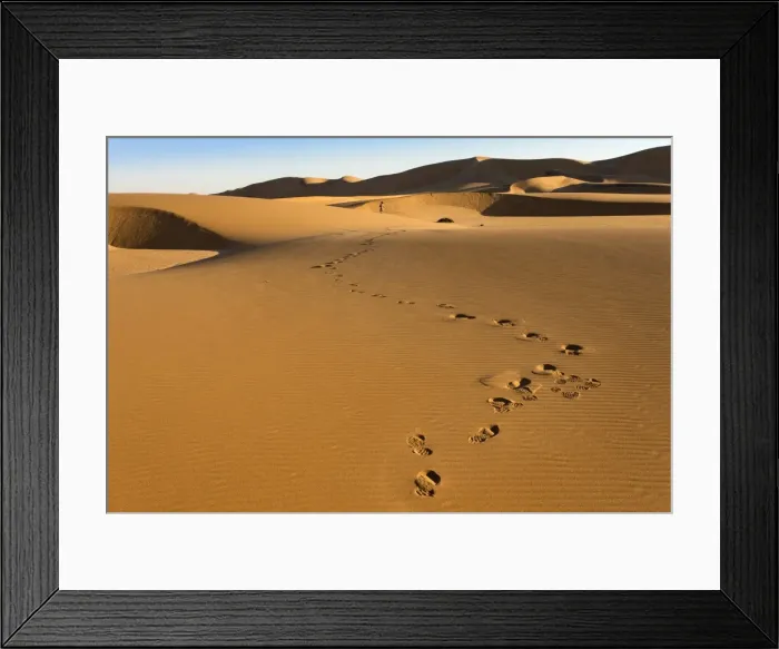 Framed Print : Tourist on sand dunes near Swakopmund, Dorob National Park, Namibia, Africa Framed Print : Tourist on sand dunes near Swakopmund, Dorob National Park, Namibia, Africa
