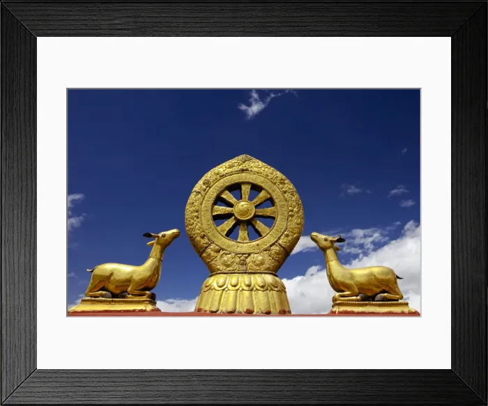 Framed Print : A golden dharma wheel and deer sculptures on the sacred Jokhang Temple roof, Barkhor Square, Lhasa, Tibet, China Framed Print : A golden dharma wheel and deer sculptures on the sacred Jokhang Temple roof, Barkhor Square, Lhasa, Tibet, China
