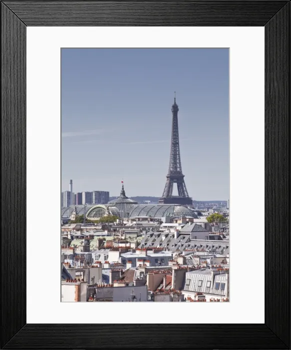 Framed Print : The Eiffel Tower rising over the rooftops of Paris, France, Europe Framed Print : The Eiffel Tower rising over the rooftops of Paris, France, Europe