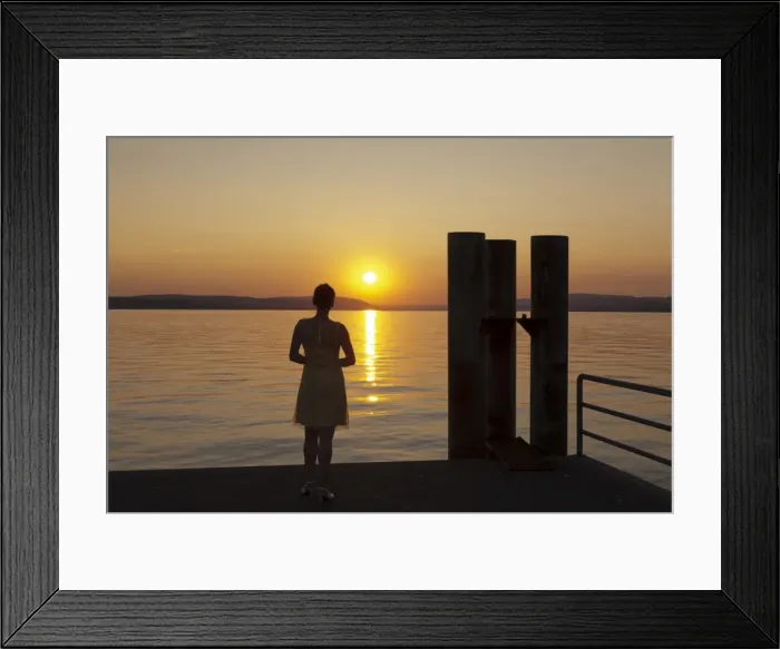 Framed Print : Woman enjoying the sunset, Unteruhldingen, Lake Constance, Baden Wurttemberg, Germany, Europe Framed Print : Woman enjoying the sunset, Unteruhldingen, Lake Constance, Baden Wurttemberg, Germany, Europe