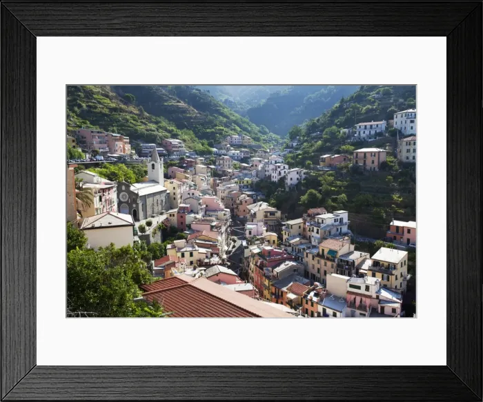 Framed Print : Riomaggiore rooftops with the Church of St. John the Baptist, Riomaggiore, Cinque Terre, UNESCO World Heritage Site, Liguria, Italy, Europe Framed Print : Riomaggiore rooftops with the Church of St. John the Baptist, Riomaggiore, Cinque Terre, UNESCO World Heritage Site, Liguria, Italy, Europe