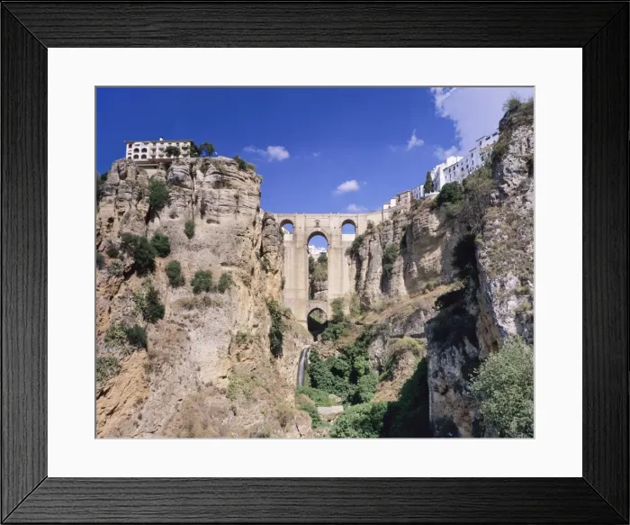 Framed Print : The bridge Puente Nuevo above the gorge of the River Rio Guadalevin, Ronda, Province Malaga, Andalusia, Spain, Europe Framed Print : The bridge Puente Nuevo above the gorge of the River Rio Guadalevin, Ronda, Province Malaga, Andalusia, Spain, Europe