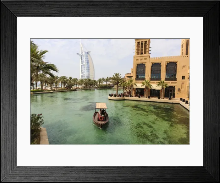 Framed Print : Dhows cruise around the Madinat Jumeirah Hotel with Burj Al Arab in the background, Dubai, United Arab Emirates, Middle East Framed Print : Dhows cruise around the Madinat Jumeirah Hotel with Burj Al Arab in the background, Dubai, United Arab Emirates, Middle East